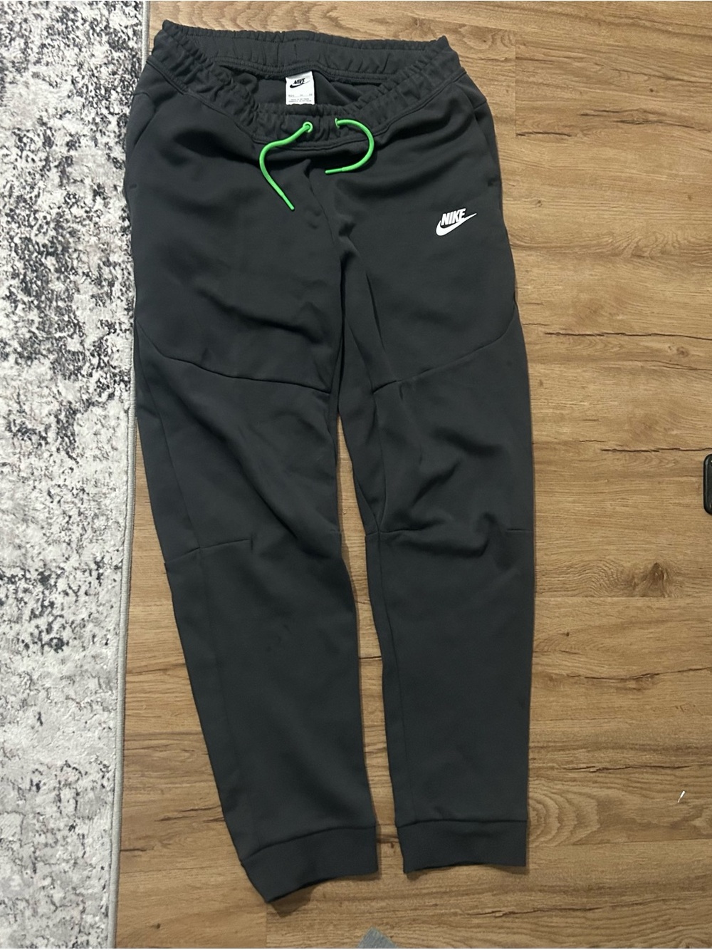 Nike Sportswear Club Fleece Jogger Pants in Charcoal/Dark Grey Heather.